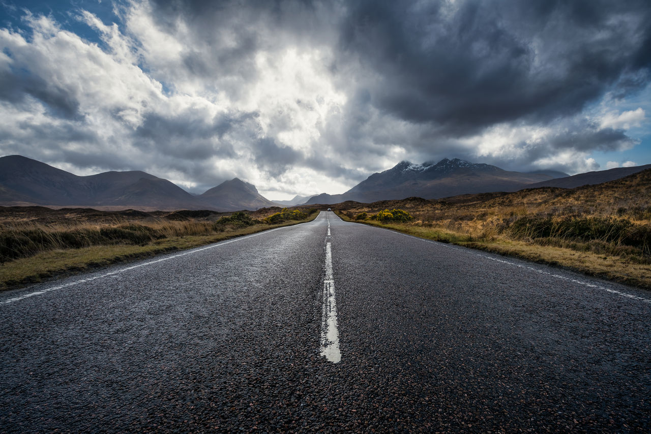 Isle of Skye, Scotland, UK. Skye, or the Isle of Skye (/skaɪ/; Scottish Gaelic: An t-Eilean Sgitheanach or Eilean a' Cheò), is the largest and northernmost of the major islands in the Inner Hebrides of Scotland. The island's peninsulas radiate from a mountainous centre dominated by the Cuillins, the rocky slopes of which provide some of the most dramatic mountain scenery in the country. Although it has been suggested that the Gaelic Sgitheanach describes a winged shape there is no definitive agreement as to the name's origins.